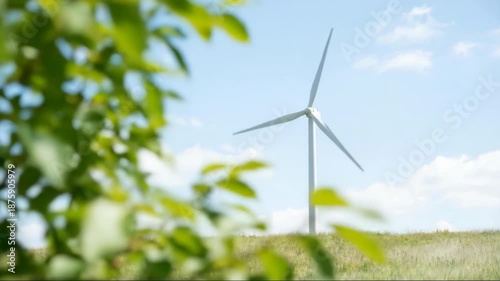 Serene wind turbine generating clean energy under a bright sky