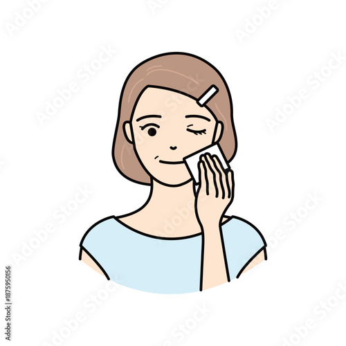 Senior woman cleaning her face with cosmetic cotton pad