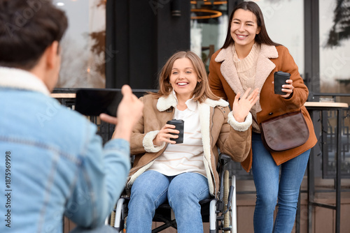 Young woman in wheelchair a...