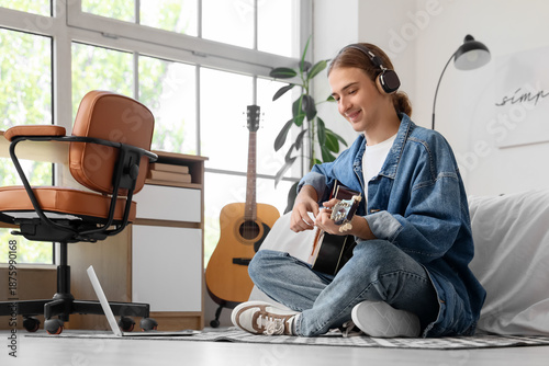 Young man with headphones a...