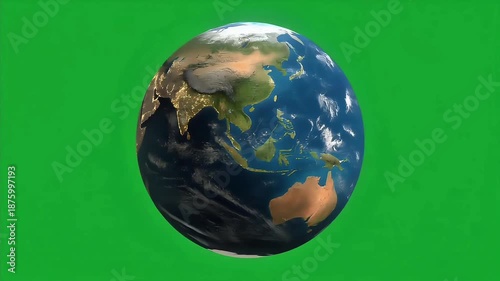 High-angle view of a realistic Earth model against a solid green background with continents and oceans visible.