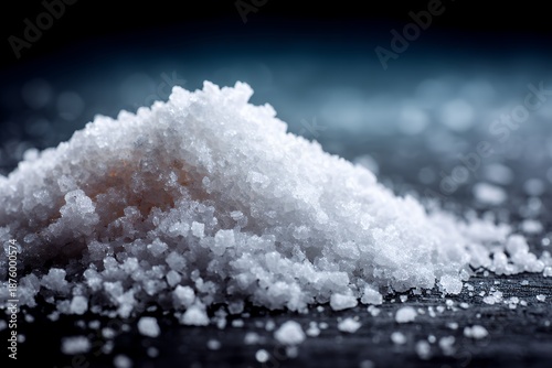 Close up macro view of a pile of coarse white salt crystals