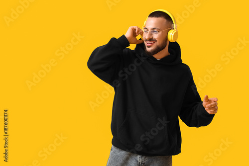 Young man in black hoodie w...