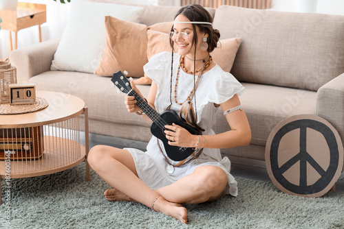 Young happy female hippie w...