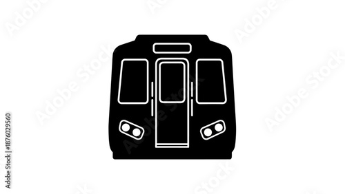 Front view of a subway train with headlights on, ready for departure