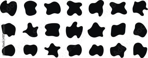 Abstract Organic Shapes: A collection of various amorphous black forms against a plain backdrop, evoking a sense of fluidity and natural design elements.