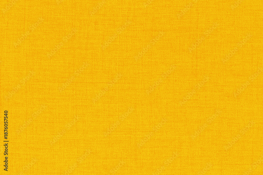 Fototapeta premium Yellow linen fabric cloth texture background, seamless pattern of natural textile.