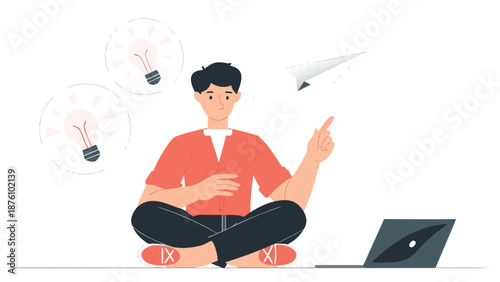 Man sitting cross-legged with laptop having ideas and inspiration