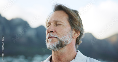 Foto Mature man, breathe and yoga outdoor with meditation, spiritual healing and mindfulness