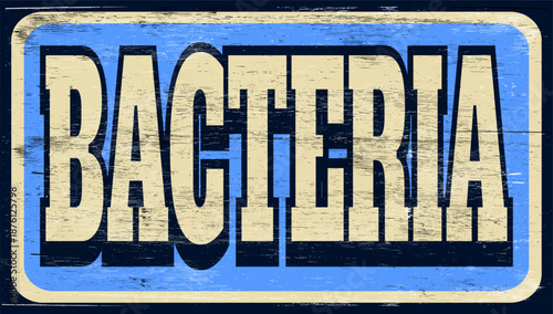 Aged retro bacteria sign on wood