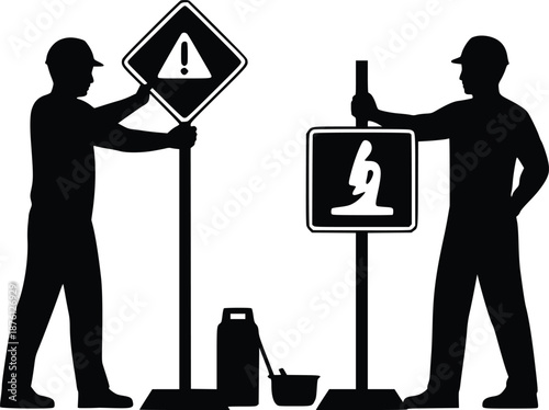 Workers installing road signs