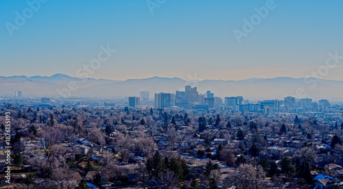 Aerial view of the City of Reno and Sparks covered in a smoggy haze during a temperature inversion.