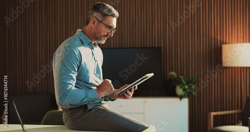 Canvastavla Tablet, research and mature businessman in office for finance report with budget review