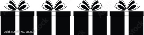 Row of four black gift boxes with white ribbons and bows isolated on a white background for holiday shopping and celebration