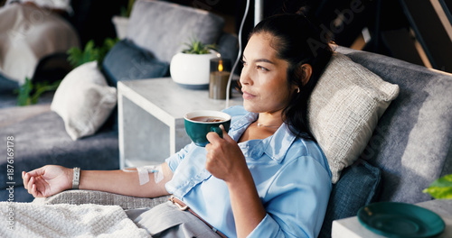 Obraz na plátně Woman, relax and tea with IV drip for nutrition, immune booster or vitamins on bed in clinic