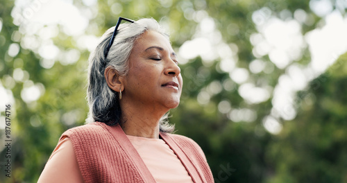 Tableau sur toile Thinking, walk or old woman in park with breath, fresh air or reflection in retirement hobby
