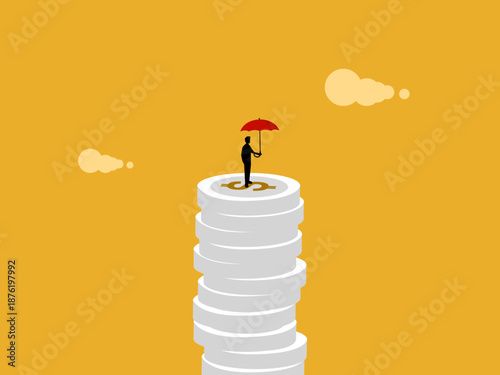 businessman successfully stands on top of the coin