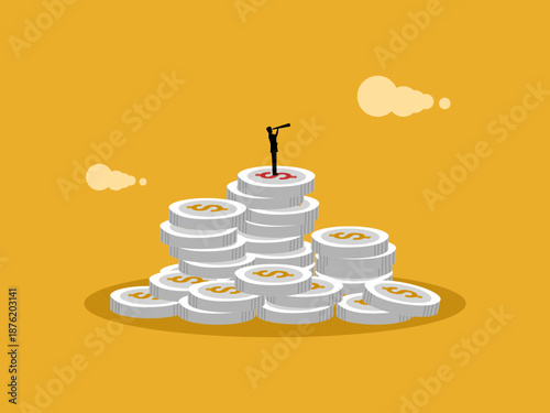 businessman has a vision built on a pile of coins