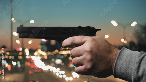 Gunshot on traffic bridge during evening commute with traffic below