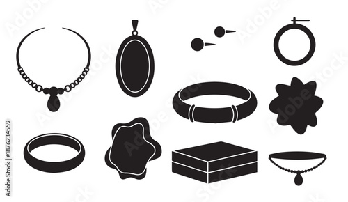 Collection of various black silhouettes of jewelry items on white background