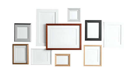 Assorted empty picture frames of different sizes and styles arranged against black