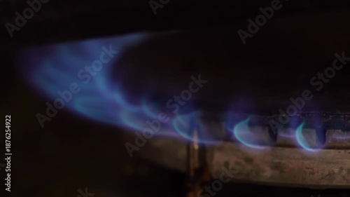 Gas Burner Ignition with Blue Flame on Kitchen Stove
