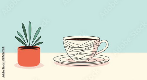 Cozy morning scene featuring a cup of black coffee or tea in a decorated ceramic mug sitting on a table next to a small potted house plant on blue.