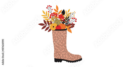 Creative autumn decoration featuring a pink rain boot with heart patterns being used as a vase for a bouquet of colorful fall leaves and berries.
