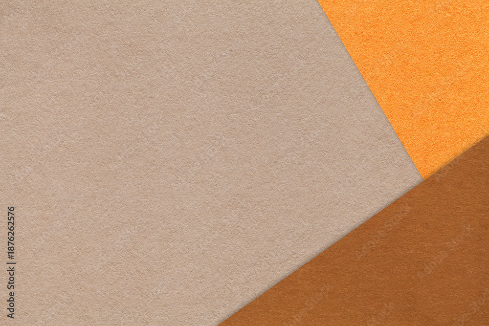 Fototapeta premium Abstract warm beige, orange and brown paper background with copy space. Template for presentation, banner, card design