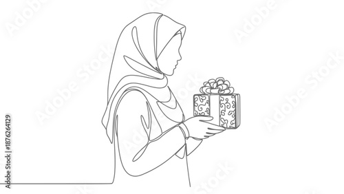 woman in hijab holding a gift box