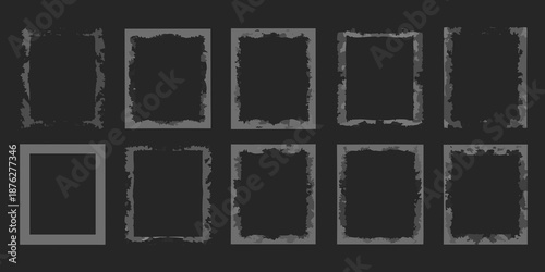 A collection of darkened rectangular frames with rough uneven edges