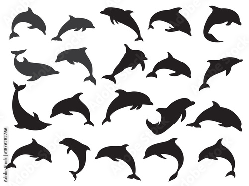 Wallpaper Mural vector set of dolphin silhouettes in different swimming poses, designed as clean solid black shapes suitable for illustration use. Torontodigital.ca