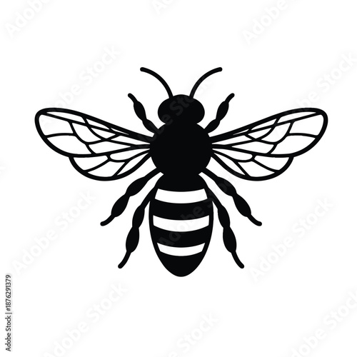 Black silhouette of bee with spread wings