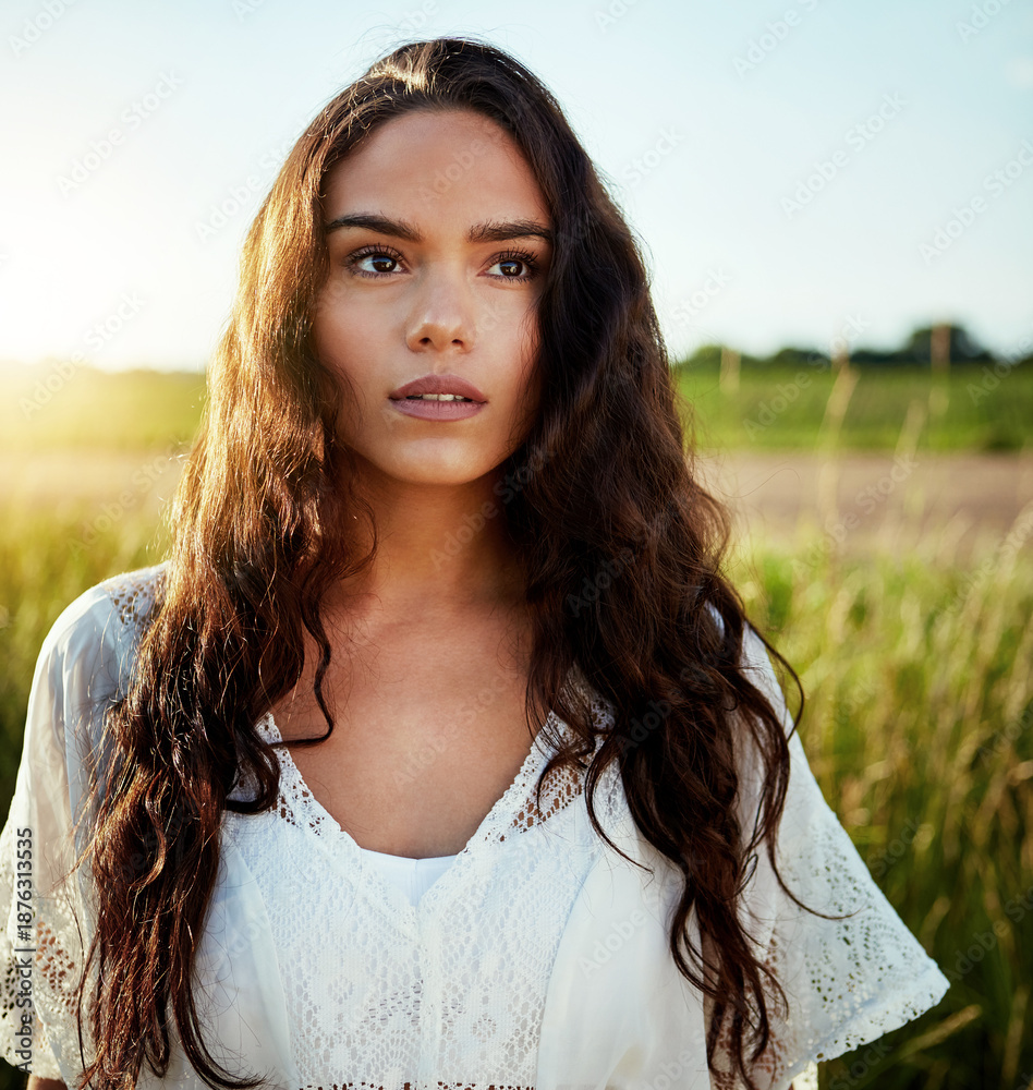 Fototapeta premium Thinking, woman and field for travel outdoor with reflection, fresh air and daydreaming on holiday. Thoughts, female person and vacation with vision, sightseeing and nostalgia memory in countryside