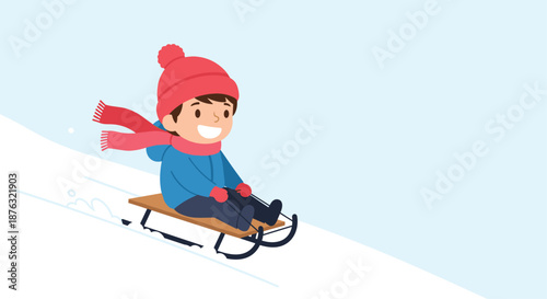 Young boy in warm winter gear including a red hat and scarf sliding down a snowy hill on a wooden sled with a big smile of pure joy.