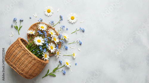 Flowers and basket for International Women's Day on 8 March in a flatlay arrangement