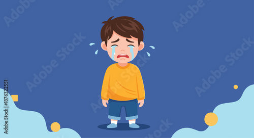 Sad young boy crying with tears on his face standing against a dark blue background with decorative abstract light blue and yellow shapes.
