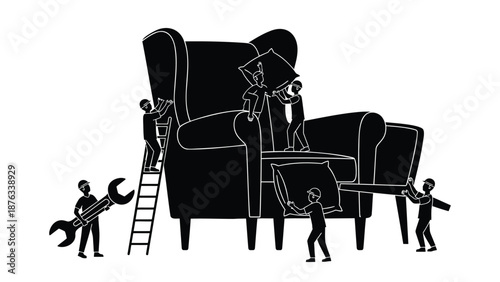 Workers assembling and repairing a large armchair with tools and teamwork