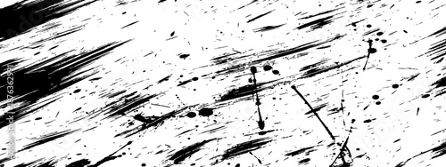 Black and white grunge texture with ink splatter and diagonal brush strokes