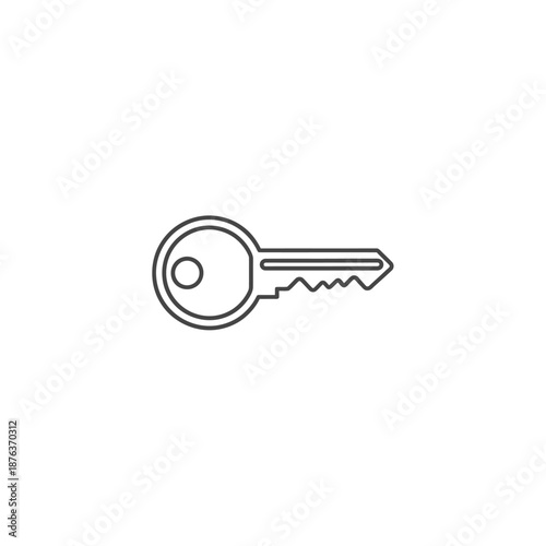 Close-Up of a Silver Key on a Light Grey Background for Security and Access Concepts