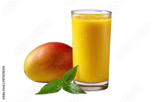 Ripe mango fruit and glass of yellow mango juice with green leaves drink beverage