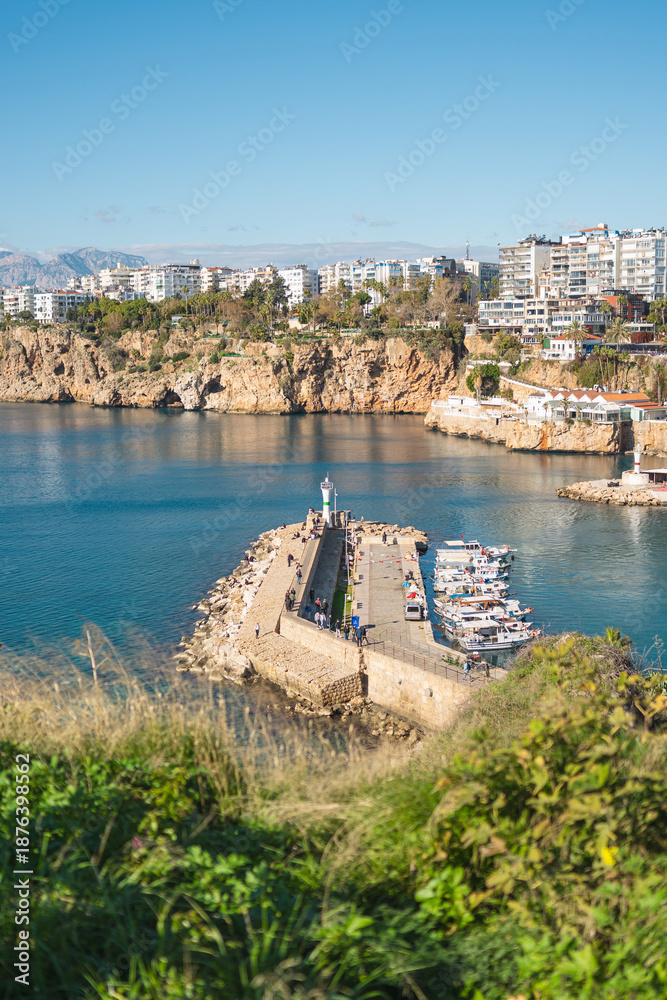 Fototapeta premium View of the Old Town Antalya Marina and tour boats in Kaleici