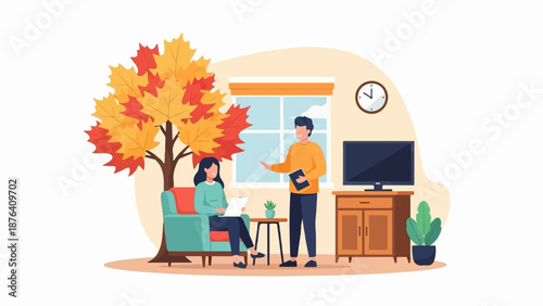 A man and woman converse indoors near a colorful autumn tree and entertainment center