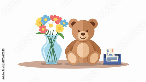 A brown teddy bear sits beside a vase of colorful flowers and a small blue holder with papers