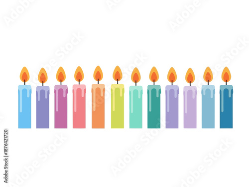 Colorful birthday candles with flame on top