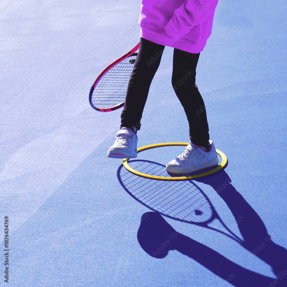Obraz premium Faceless image of a girl playing during an after-school tennis activity