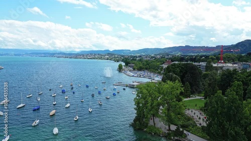 Lake Zurich Aerial with Boats and Green Shoreline – Swiss Summer Landscape.Filmed on 19 July 2025.