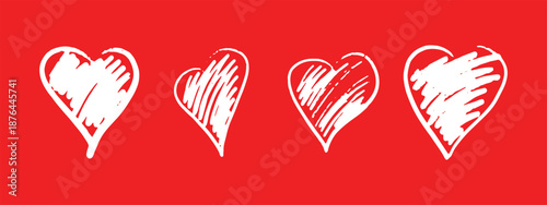 A set of red hearts drawn with chalk and wax crayons. Rough lines and bold shapes. A vector illustration in the style of a valentine. Hand-drawn design elements.