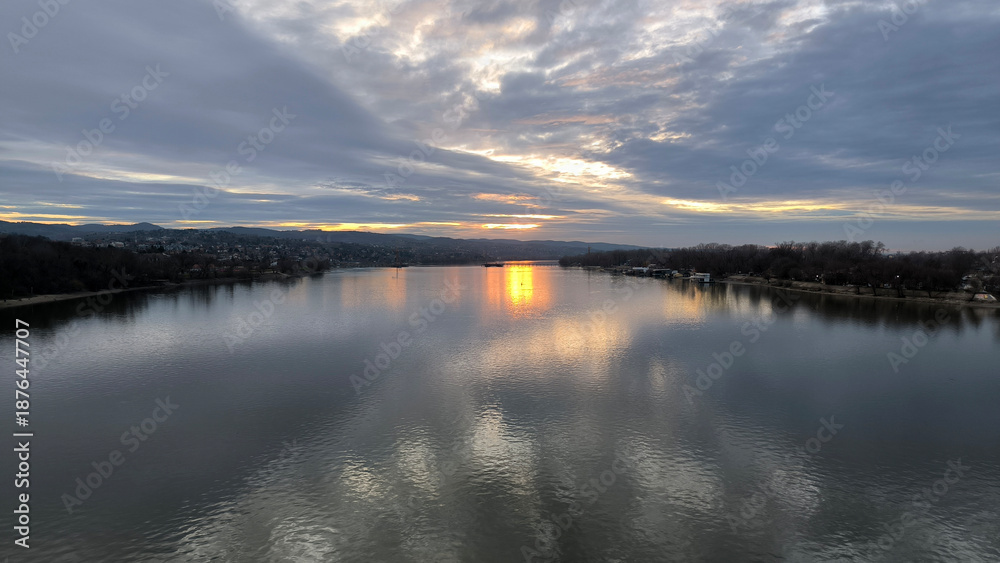 Fototapeta premium colorful sky at the sunset over the Danube river in Novi Sad reflected on the water surface