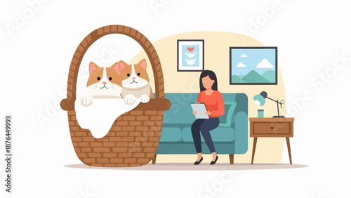 A woman sits on a sofa looking at a tablet, with two cats in a basket